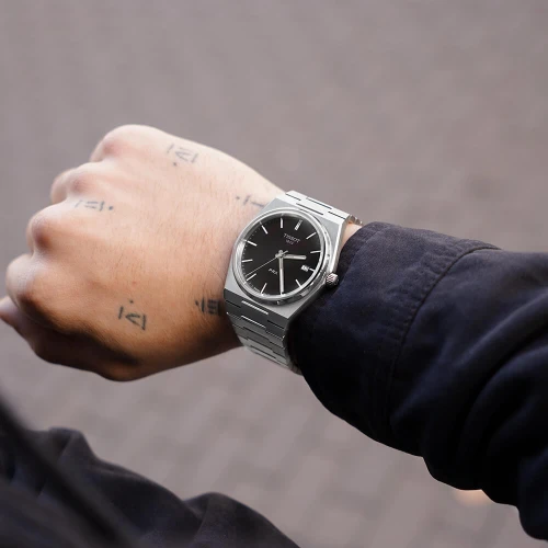 Чоловічий годинник TISSOT PRX T137.410.11.051.00 купити за ціною 20480 грн на сайті - THEWATCH