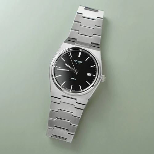 Чоловічий годинник TISSOT PRX T137.410.11.051.00 купити за ціною 20480 грн на сайті - THEWATCH