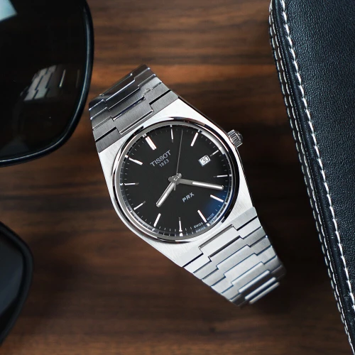 Чоловічий годинник TISSOT PRX T137.410.11.051.00 купити за ціною 20480 грн на сайті - THEWATCH