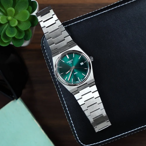 Чоловічий годинник TISSOT PRX T137.410.11.091.00 купити за ціною 20480 грн на сайті - THEWATCH