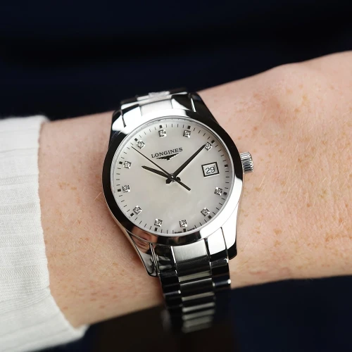 Жіночий годинник LONGINES CONQUEST CLASSIC L2.386.4.87.6 купити за ціною 84110 грн на сайті - THEWATCH