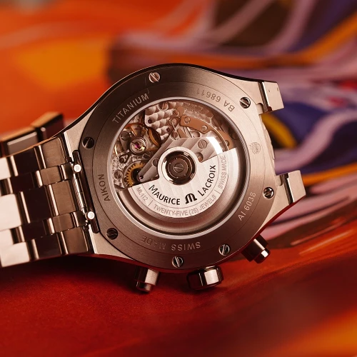 Чоловічий годинник MAURICE LACROIX AIKON AUTOMATIC TITANIUM CHRONOGRAPH AI6038-TT032-430-1 купити за ціною 259250 грн на сайті - THEWATCH